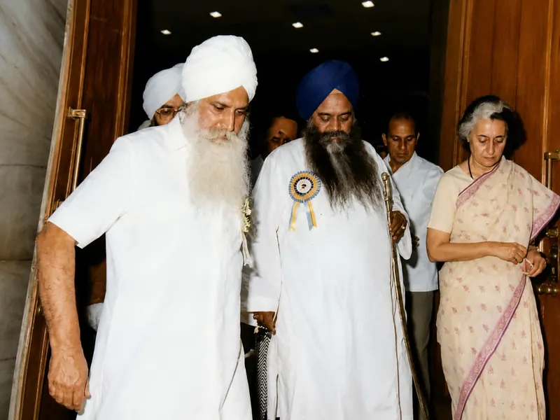 Walking through a doorway in a delegation, Indira Gandhi following.